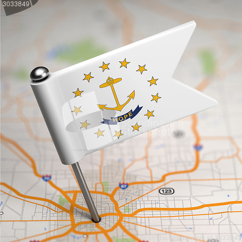 Image of Rhode Island Small Flag on a Map Background.