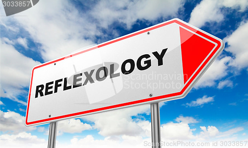 Image of Reflexology on Red Road Sign.
