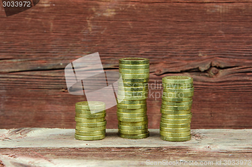 Image of Piles of golden coins