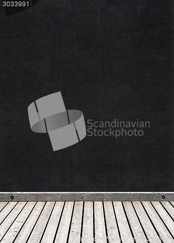 Image of black wall and wooden floor background 