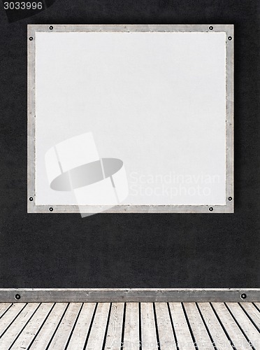 Image of white stucco wall with a board for text