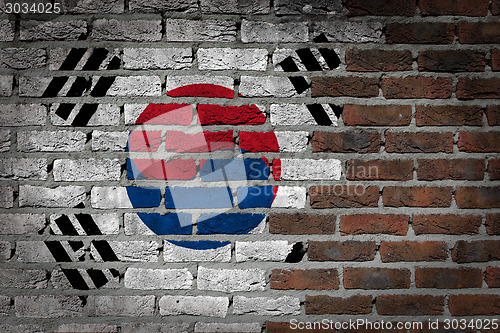 Image of Brick wall texture with flag