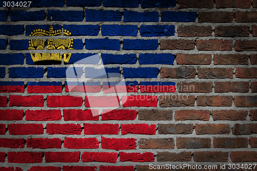 Image of Brick wall texture with flag