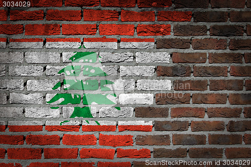 Image of Brick wall texture with flag