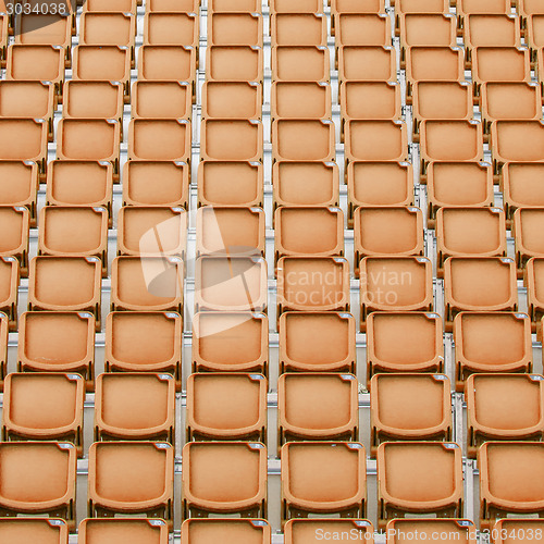 Image of Orange seat in sport stadium