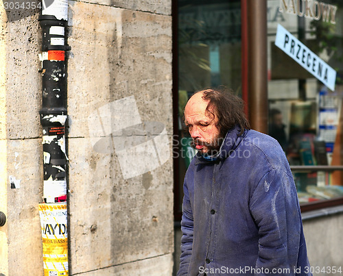 Image of Sad man walking in the city