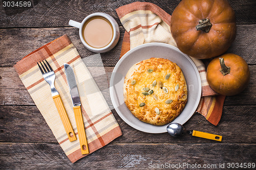 Image of Morning coffee with flat bread and pumpkins in rustic style