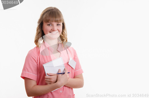 Image of Portrait of girl in a medical shirt