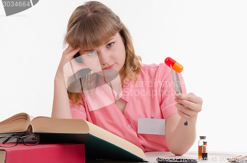 Image of Tired student studying composition pills