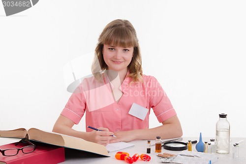 Image of Friendly pharmacist at your desk