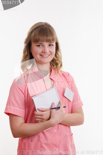 Image of Portrait of girl in a medical shirt