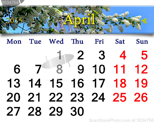 Image of calendar for April of 2015 year with image of bird cherry tree