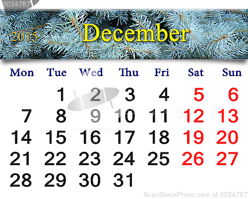 Image of calendar for the December of 2015 with evergreen spruce