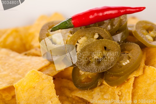 Image of Nachos with cheese sauce and chilli pepperoni