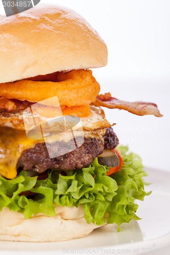 Image of Delicious egg and bacon cheeseburger