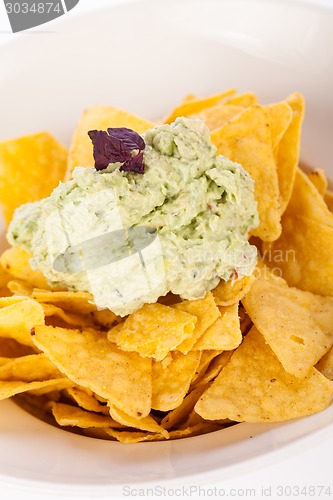 Image of Crisp corn nachos with guacamole sauce