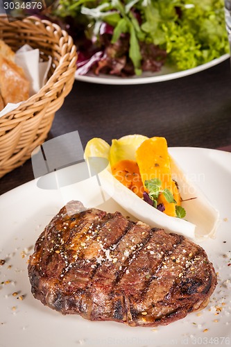 Image of Grilled beef steak with seasoning
