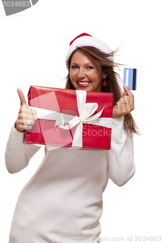 Image of Woman holding a Christmas gift and bank card