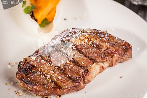 Image of Grilled beef steak with seasoning