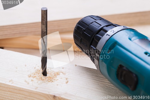 Image of Battery operated hand drill and bit