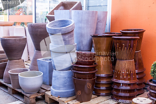 Image of Glazed and unglazed ceramic flower pots