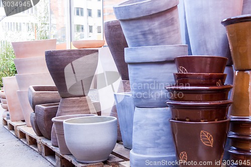 Image of Glazed and unglazed ceramic flower pots