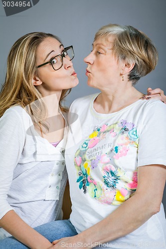 Image of Loving grandmother and granddaughter