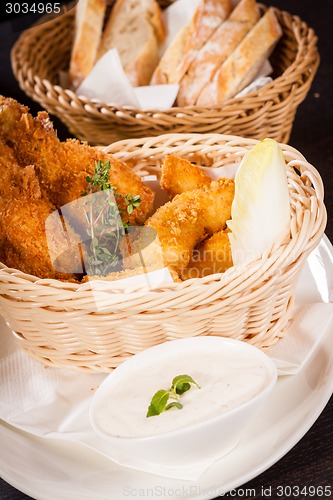 Image of Crisp crunchy golden chicken legs and wings