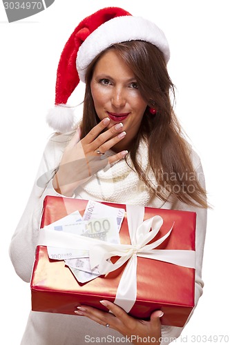 Image of Young woman with an Xmas gift and money