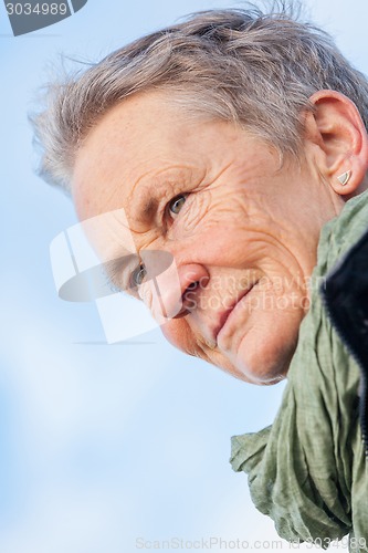 Image of happy grey-haired elderly woman senior outdoor