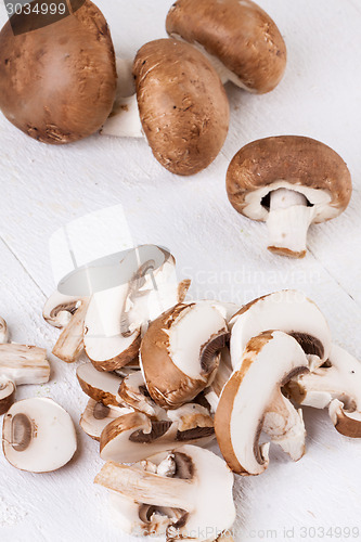 Image of Diced and whole agaricus brown button mushrooms