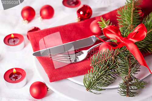 Image of Red themed Christmas place setting