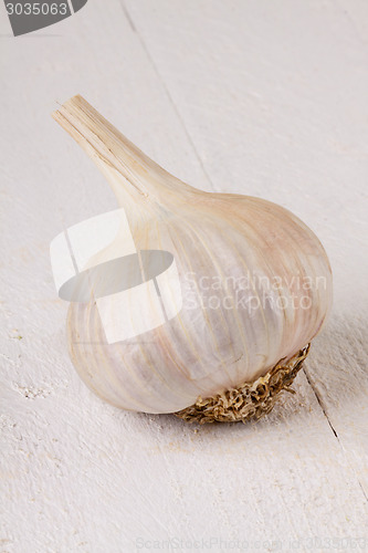 Image of Fresh garlic bulb with loose cloves