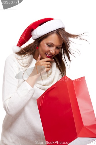 Image of Happy vivacious Christmas shopper