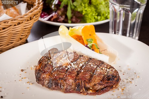 Image of Grilled beef steak with seasoning