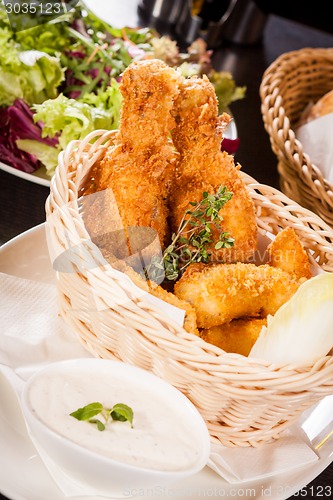 Image of Crisp crunchy golden chicken legs and wings