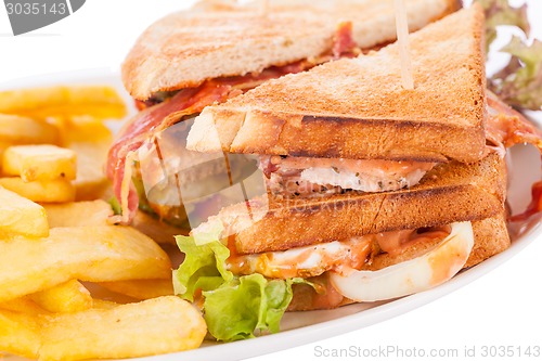 Image of Club sandwich with potato French fries