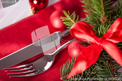 Image of Red themed Christmas place setting