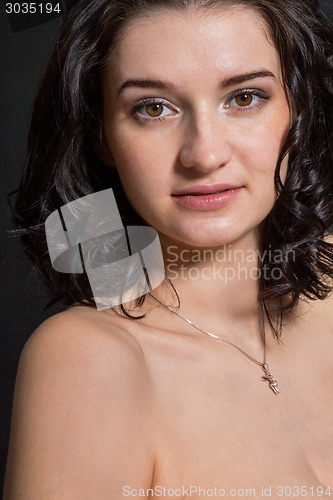 Image of Dark portrait of a beautiful woman