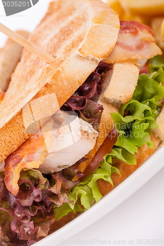 Image of Club sandwich with potato French fries