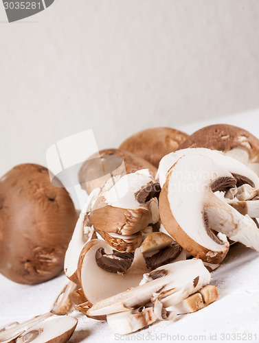 Image of Diced and whole agaricus brown button mushrooms