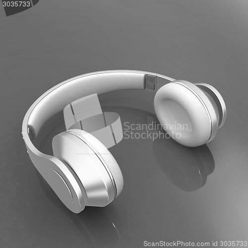 Image of White headphones isolated on a red background 