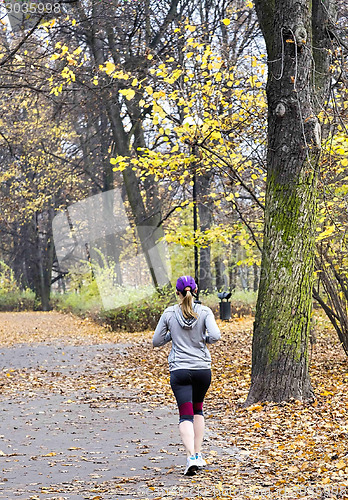 Image of Female jogger in   park