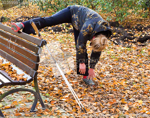 Image of woman exercising in the park