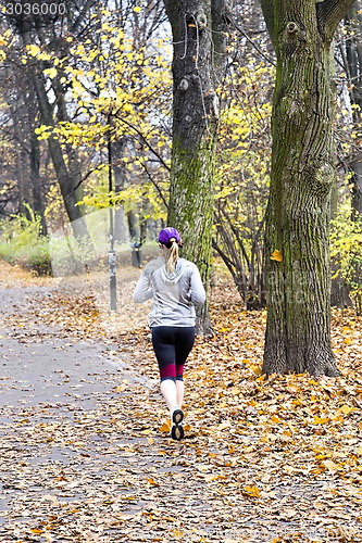 Image of Female jogger in   park