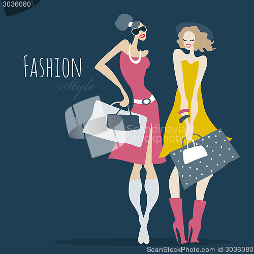 Image of Fashion girls. Women with shopping bags.