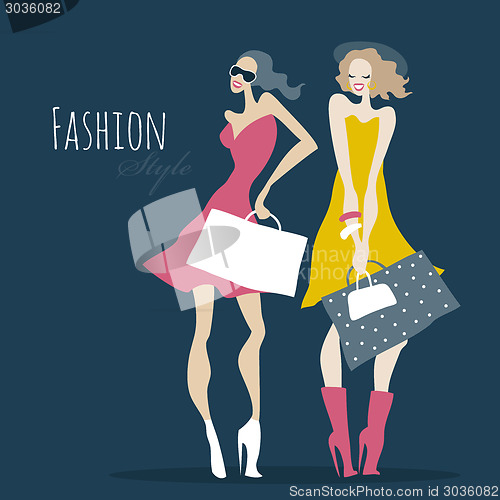 Image of Fashion girls. Women with shopping bags.