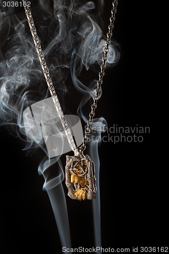 Image of Men's pendant with a tiger in the smoke