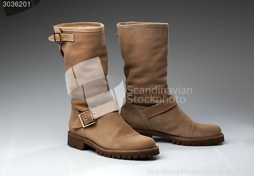 Image of beige suede fashionable winter boots