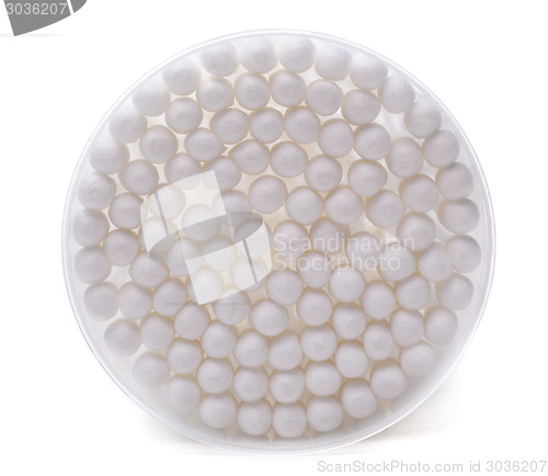 Image of Cotton buds in a round plastic container